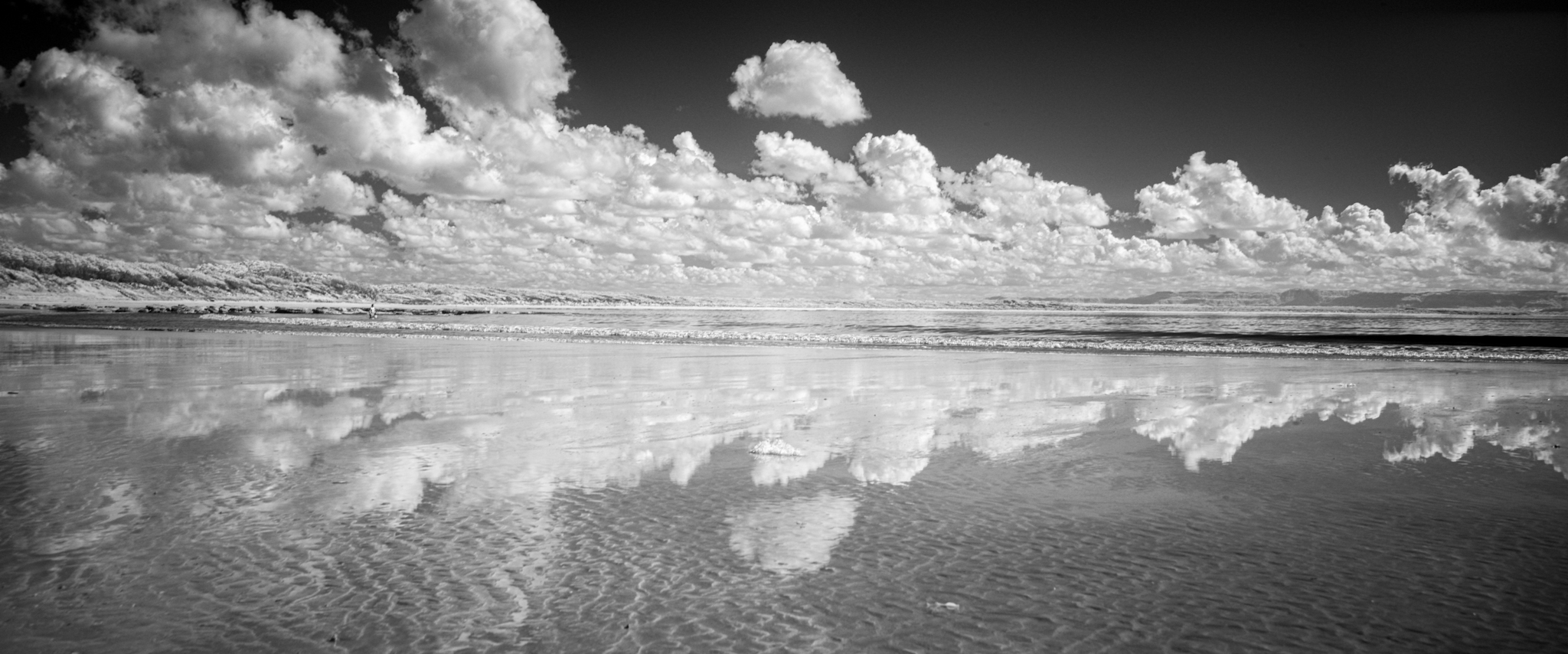 Black and white infrared anamorphic photo of the beach at Currarong.